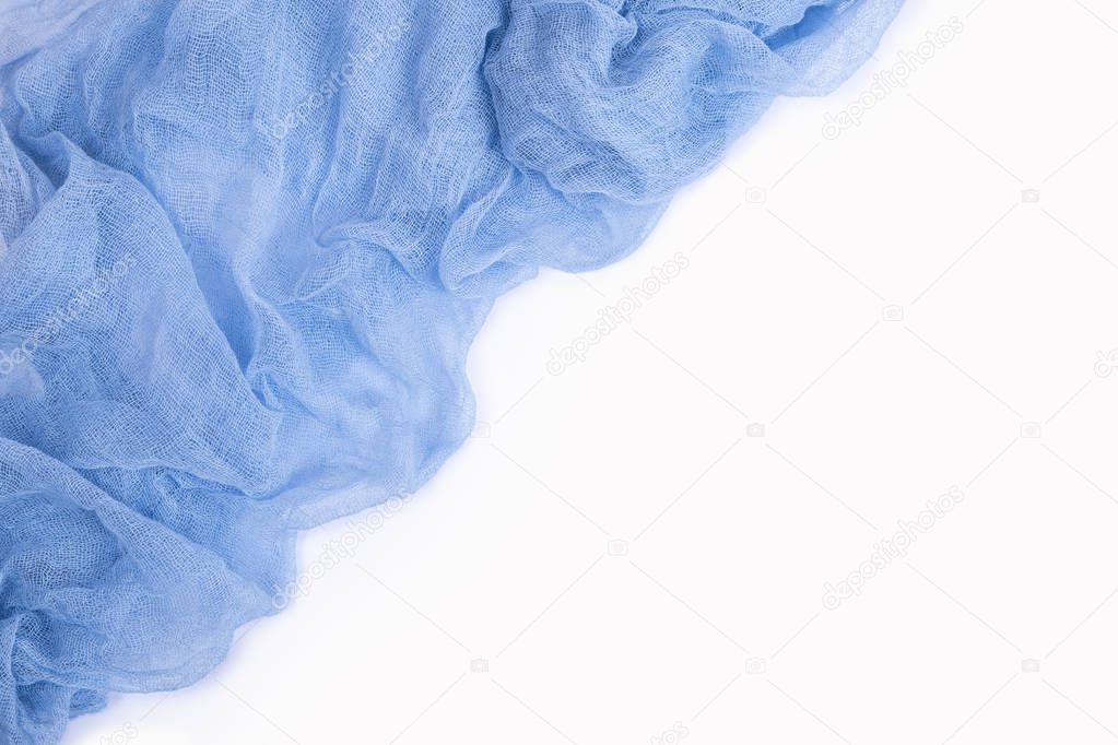 Dark blue gauze fabric isolated on white background. Top view.