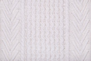 Dokulu arka plan beyaz kazak örgü. 