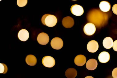 Bokeh ve sarı renkli arka plan ışığı defocused. Festival kavramı. 