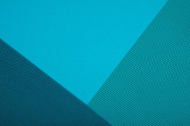 Soyut dokulu geometrik kağıt zümrüt ve mavi-yeşil ikili renkleri arka plan.