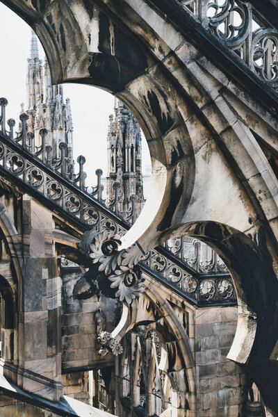 Architecture details of rooftop terraces of Duomo Milan Cathedral, Italy. 