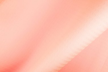 Yoga ya da spor için şeftali rengi arka plan paspasının üst görüntüsü. Yoga pilates sporu konsepti. Düz Yat.