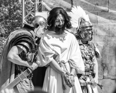 Paskalya tiyatro prodüksiyonu. Awesome oyunculuk oyunu. İsa Mesih'in ihaneti, ölümü ve dirilişi. Yahudiler, Romalı askerler, İsa'nın ve İsa'nın müritleri. Olaylar Odessa şehrinin merkez caddesinde gerçekleşecek, Ukrayna, Nisan 27, 2019.