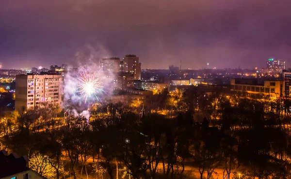 Firework on New Year\'s Eve over the city.
