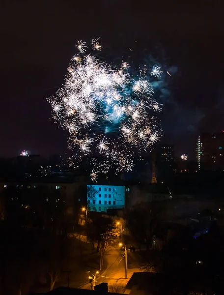 Firework on New Year\'s Eve over the city.