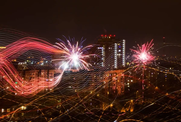 Firework on New Year\'s Eve over the city.