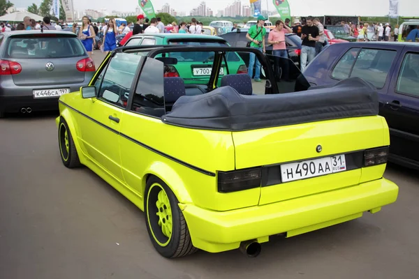 Moscow. Russia - May 20, 2019: Tuned Classic Volkswagen Golf mk 1 convertible in lime color parked on the street.