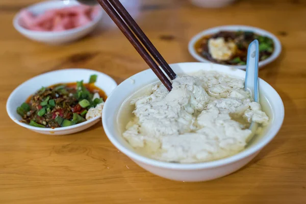 Tofu in a bowl with spicy sauce — Stock Photo, Image