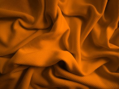 Turuncu buruşuk kumaş arkaplan. Dalgalı kumaş dokusu