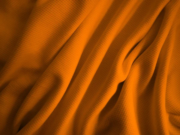 Turuncu buruşuk kumaş arkaplan. Dalgalı kumaş dokusu