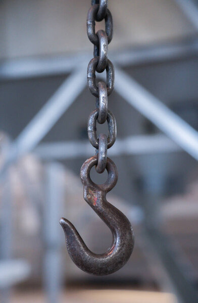 Crane hook in the workshop in the hangar