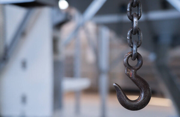 Crane hook in the workshop in the hangar