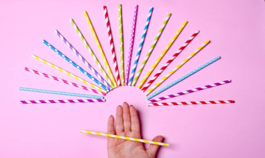 Colorful drink straws for background clipart