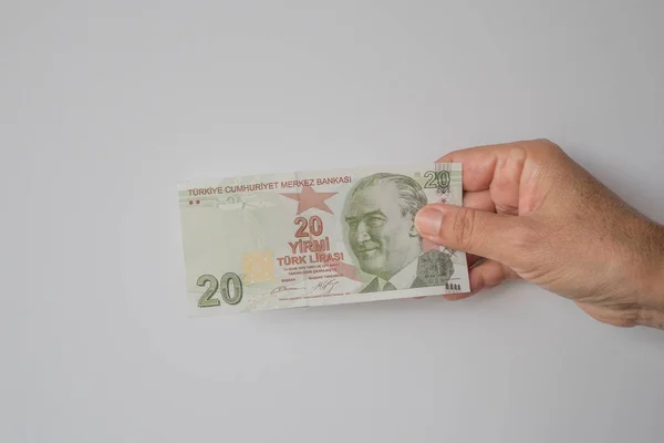 Beyaz bir arka plan üzerinde düzenlenen Türk Lirası