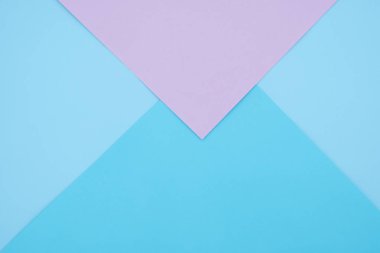 Mavi ve pembe pastel renk kağıt geometrik düz yatıyordu arka plan -