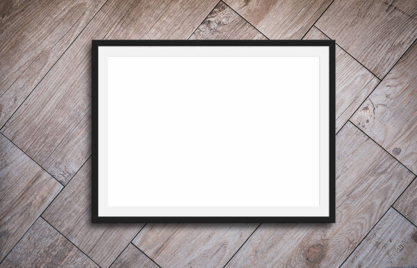 Black frame mockup on for picture or text, wooden background