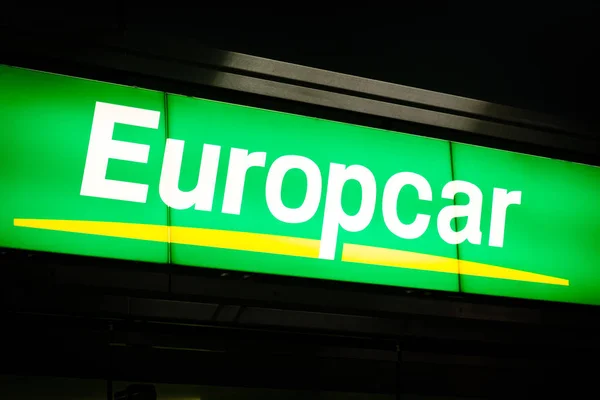 Europcar logo on store front. Sixt is a car rental  company — Stock Photo, Image