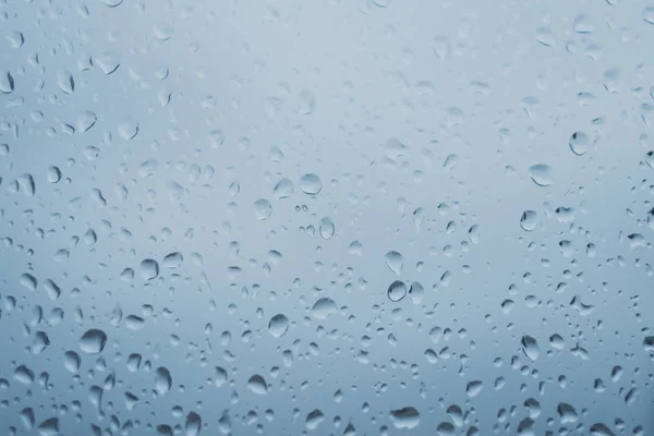 Gotas de agua en la ventana - gotas en el vidrio   - — Foto de Stock