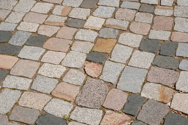Ciottoli pavimentazione in pietra - ciottoli marciapiede — Foto Stock