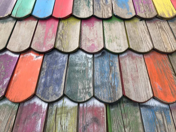 wooden roof tiles closeup of colorful playground house roof
