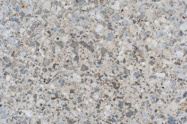 Doku veya bir ışık granit döşeme arka planı için tasarım taşlı serpiştirilmiş. Granit levha, mermer doku