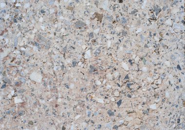 Doku veya bir ışık granit döşeme arka planı için tasarım taşlı serpiştirilmiş. Granit levha, mermer doku