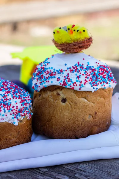 classic Slavic Easter cakes with Easter eggs on a wooden table