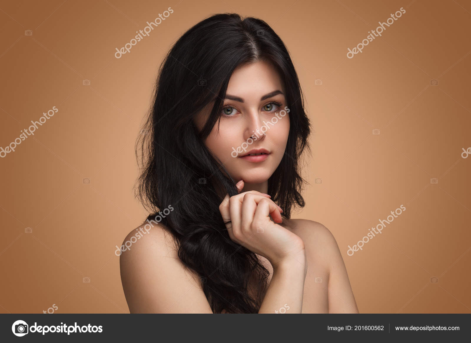 Cute Young Brunette - Beautiful brunette woman in studio Stock Photo by Â©kegfire 201600562