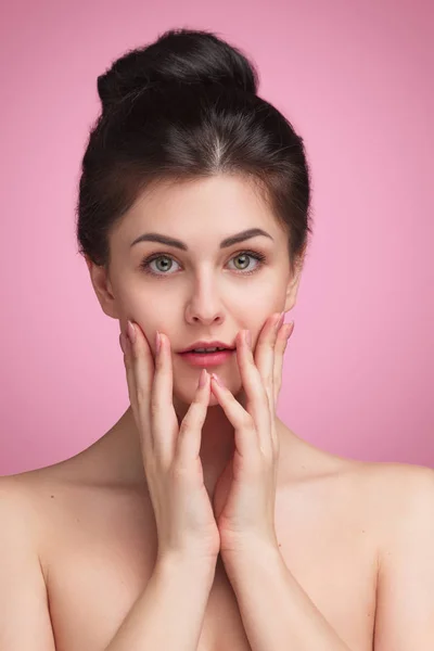 Pretty woman touching cheeks — Stock Photo, Image