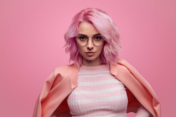 Sensual hipster woman with pink hair