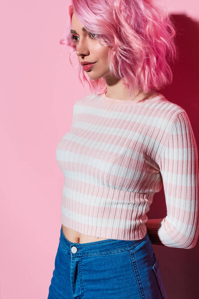 Beautiful young informal woman with pink hair