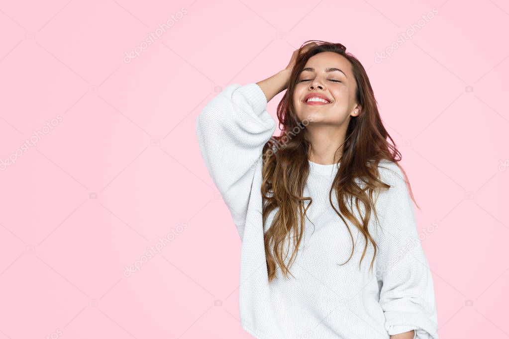 Cheerful woman with closed eyes