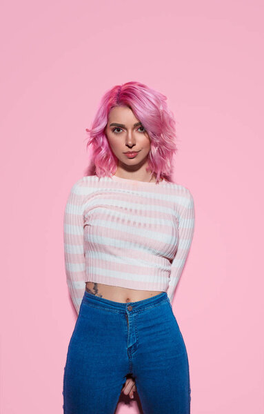 Trendy millennial woman in striped shirt