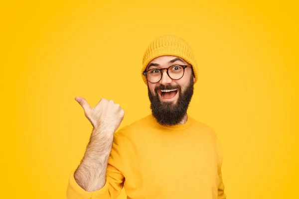 Funny guy pointing aside — Stock Photo, Image