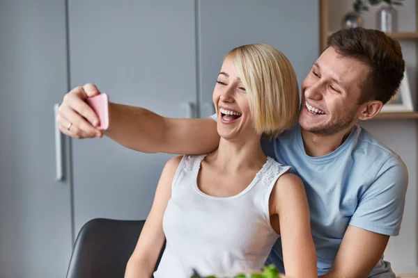 Happy couple taking selfie together — Stock Photo, Image