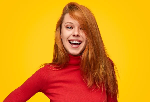 Playful flirty girl in red turtleneck — Stock Photo, Image