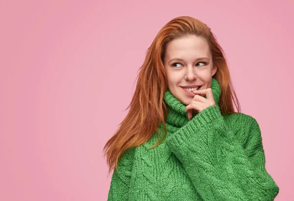 Charming flirty girl in green sweater — Stock Photo, Image
