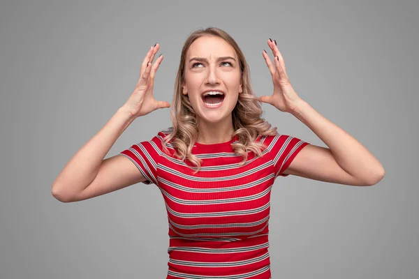 Angry teenager yelling and looking away — Stock Photo, Image