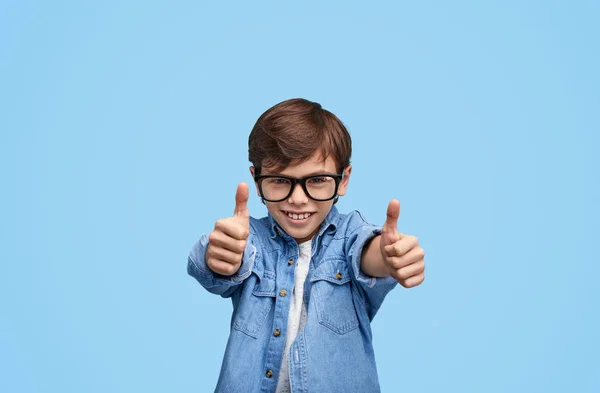 Cool little boy showing thumbs up — Stock Photo, Image