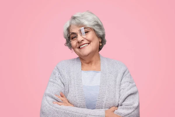 Confident elderly lady looking at camera Stock Image