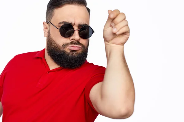 Man in stylish glasses gesturing with hand — Stock Photo, Image