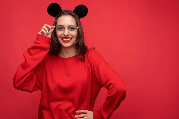 Charming woman wearing black mouse ears