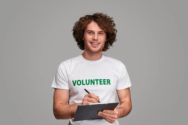 Volunteer filling poll list — Stock Photo, Image