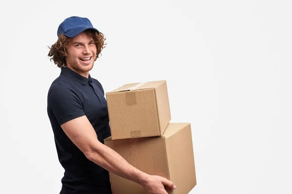 Cheerful courier of free shipping service — Stock Photo, Image