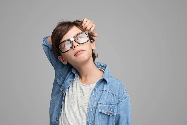 Thoughtful boy looking up — Stock Photo, Image