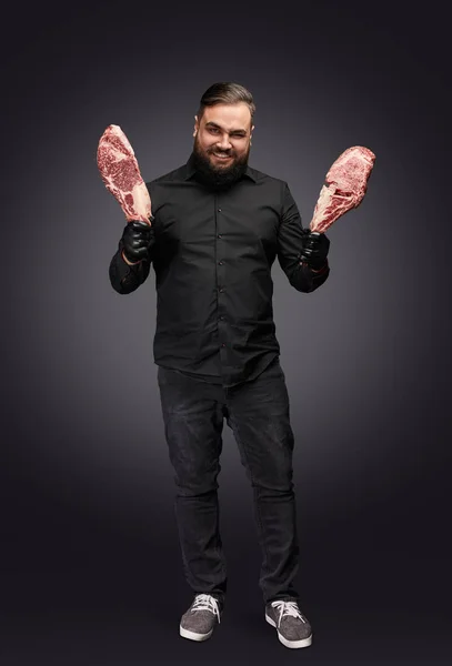 Spooky butcher with fresh meat — Stockfoto