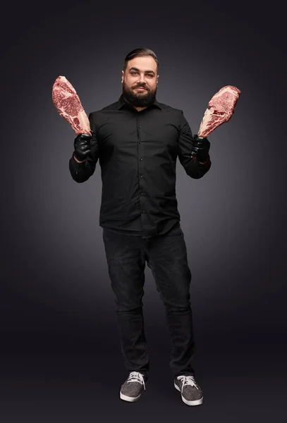 Handsome cook man with marble meat — Stock Photo, Image