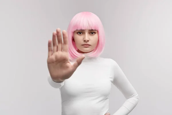 Futuristic woman gesturing stop — Stock Photo, Image