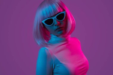 Young female in trendy sunglasses