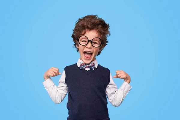 Excited schoolboy looking at camera — Stock Photo, Image